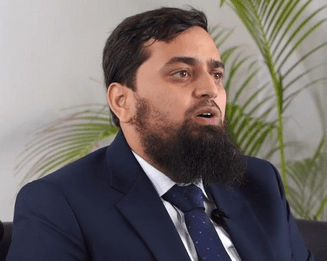 Engr. Wasif Nazar Siddiqui, Managing Director of ATIF NAZAR (Pvt.) Ltd., seated indoors and speaking