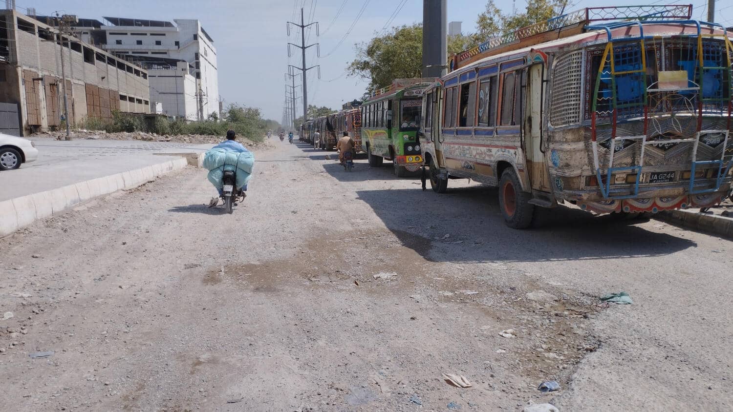 Existing condition — the carriageway on Road 10000, Korangi. Road 10000 Rehabilitation, Korangi, Korangi, Karachi